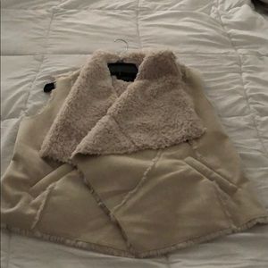 Women’s Vest. Faux fur inside and trim. Never worn